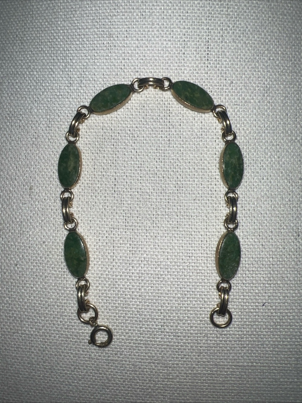 Gold-Tone Bracelet with Green Oval Stone Links